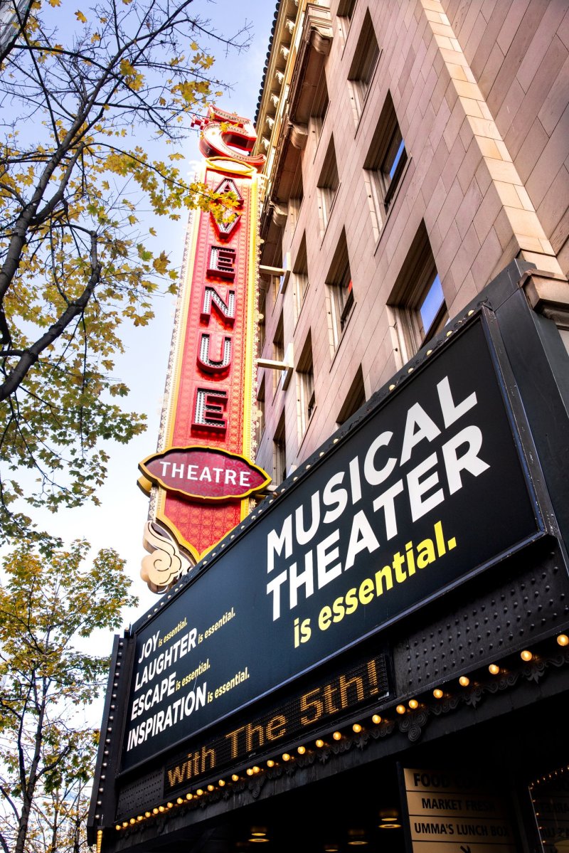 The sign outside of the 5th Avenue Theater in Seattle WA reads "Musical Theater is essential." in